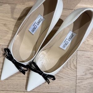 Jimmy Choo Cream Pointed-Toe Pumps with Black Patent Bow